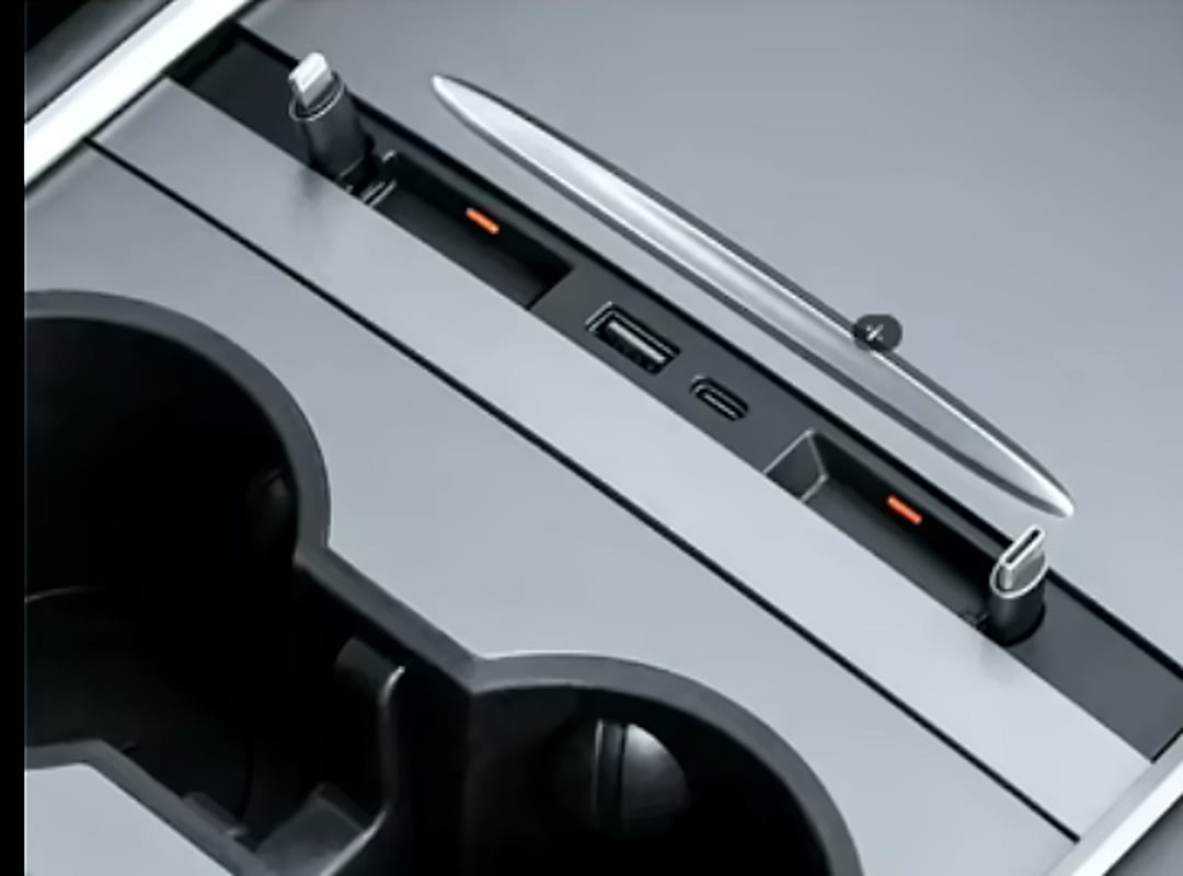 Close-up of the hub ports in a Tesla console